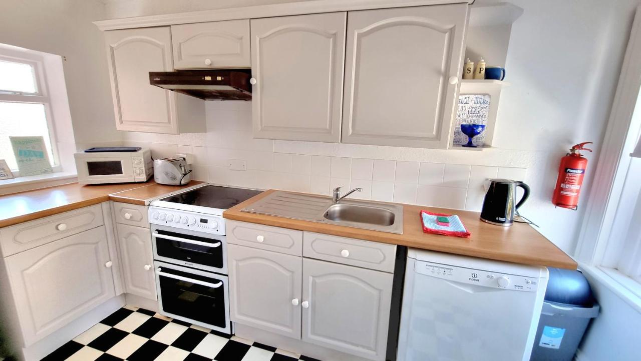 บีชคอมเบอร์ ฮอลิเดย์ อพาร์ตเมนต์ Apartment สวาเนจ ภายนอก รูปภาพ