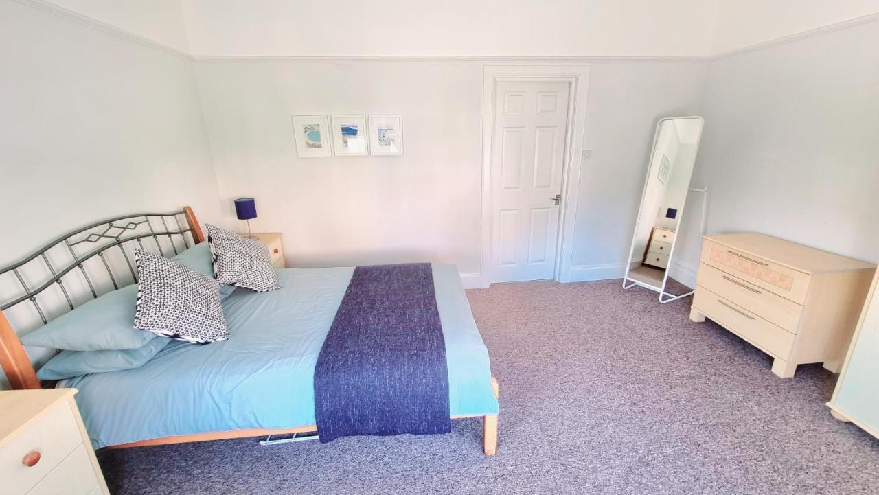 บีชคอมเบอร์ ฮอลิเดย์ อพาร์ตเมนต์ Apartment สวาเนจ ภายนอก รูปภาพ