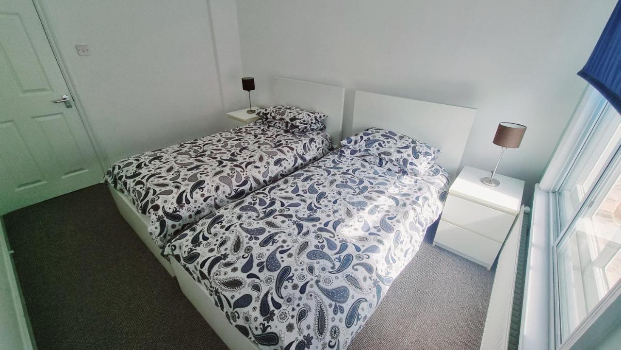 บีชคอมเบอร์ ฮอลิเดย์ อพาร์ตเมนต์ Apartment สวาเนจ ภายนอก รูปภาพ