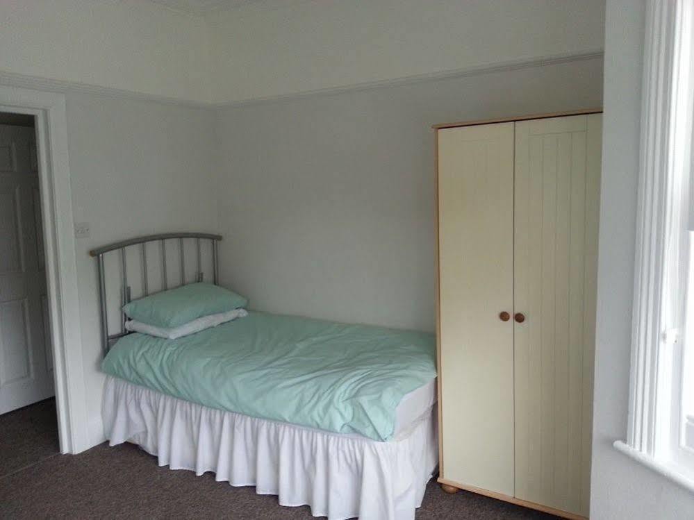 บีชคอมเบอร์ ฮอลิเดย์ อพาร์ตเมนต์ Apartment สวาเนจ ภายนอก รูปภาพ